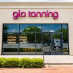 Addison store front view glo tanning.