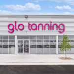 A glo tanning front view of the jonesboro branch.