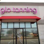 Front view of a glo tanning salon.